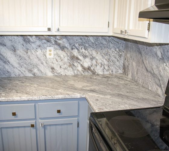 Granite Thunder White Leathered 3CM Kitchen Remodel by Olympia Stone project photo 12