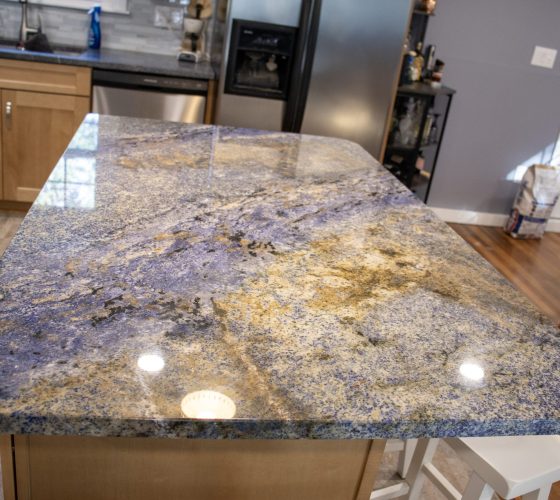 American Soapstone Granite On Perimeter Tops; Blue Bahia Granite On Island Kitchen Remodel by Olympia Stone project photo 7