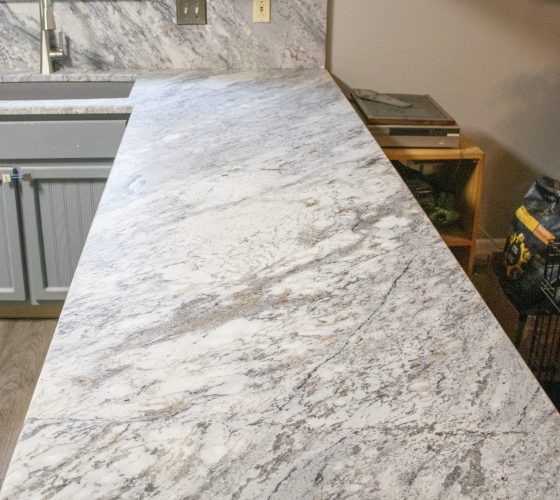 Granite Thunder White Leathered 3CM Kitchen Remodel by Olympia Stone project photo 5