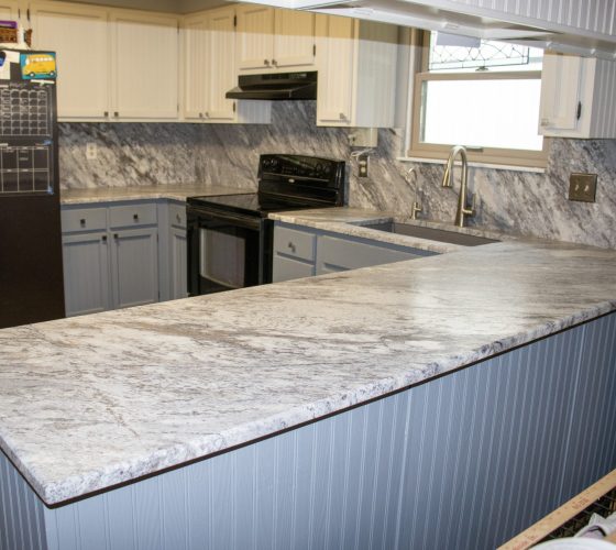 Granite Thunder White Leathered 3CM Kitchen Remodel by Olympia Stone project photo 4