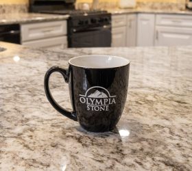 Kitchen remodel with new granite countertops with a new bathroom vanity top as well. Showing off their new tops AND coffee mug from Olympia Stone!