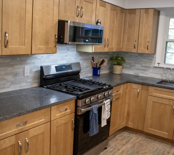 American Soapstone Granite On Perimeter Tops; Blue Bahia Granite On Island Kitchen Remodel by Olympia Stone project photo 6
