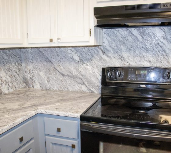 Granite Thunder White Leathered 3CM Kitchen Remodel by Olympia Stone project photo 11