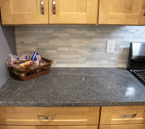 American Soapstone Granite On Perimeter Tops; Blue Bahia Granite On Island Kitchen Remodel by Olympia Stone project photo 5