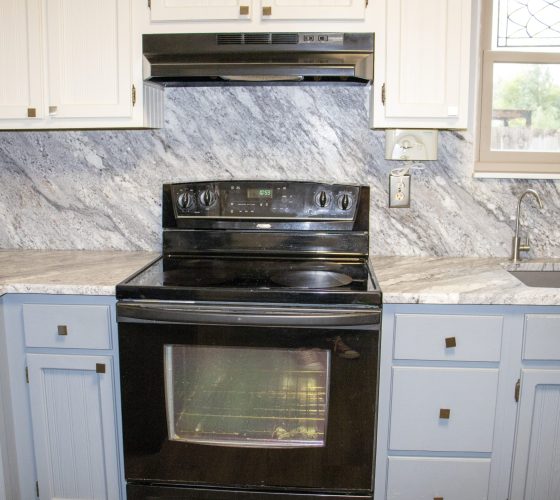 Granite Thunder White Leathered 3CM Kitchen Remodel by Olympia Stone project photo 10