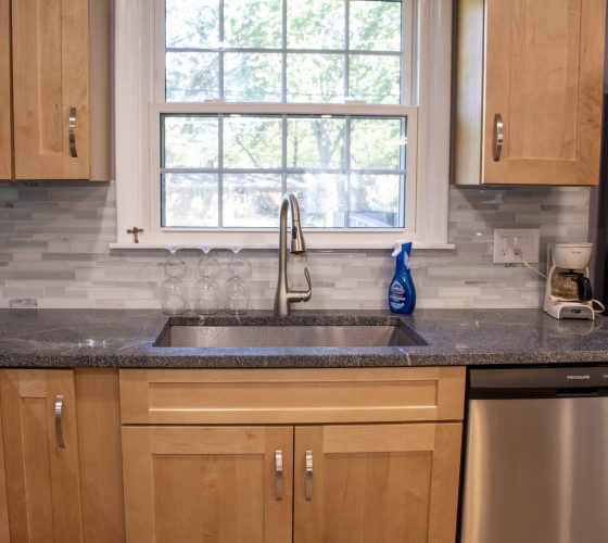 American Soapstone Granite On Perimeter Tops; Blue Bahia Granite On Island Kitchen Remodel by Olympia Stone project photo 2
