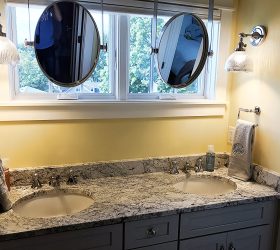 bathroom countertops with two mirrors